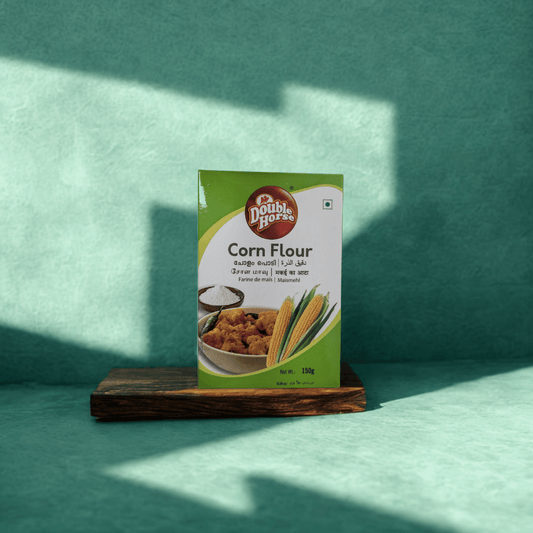 Box of Double Horse Corn Flour on a wooden stand with a green background