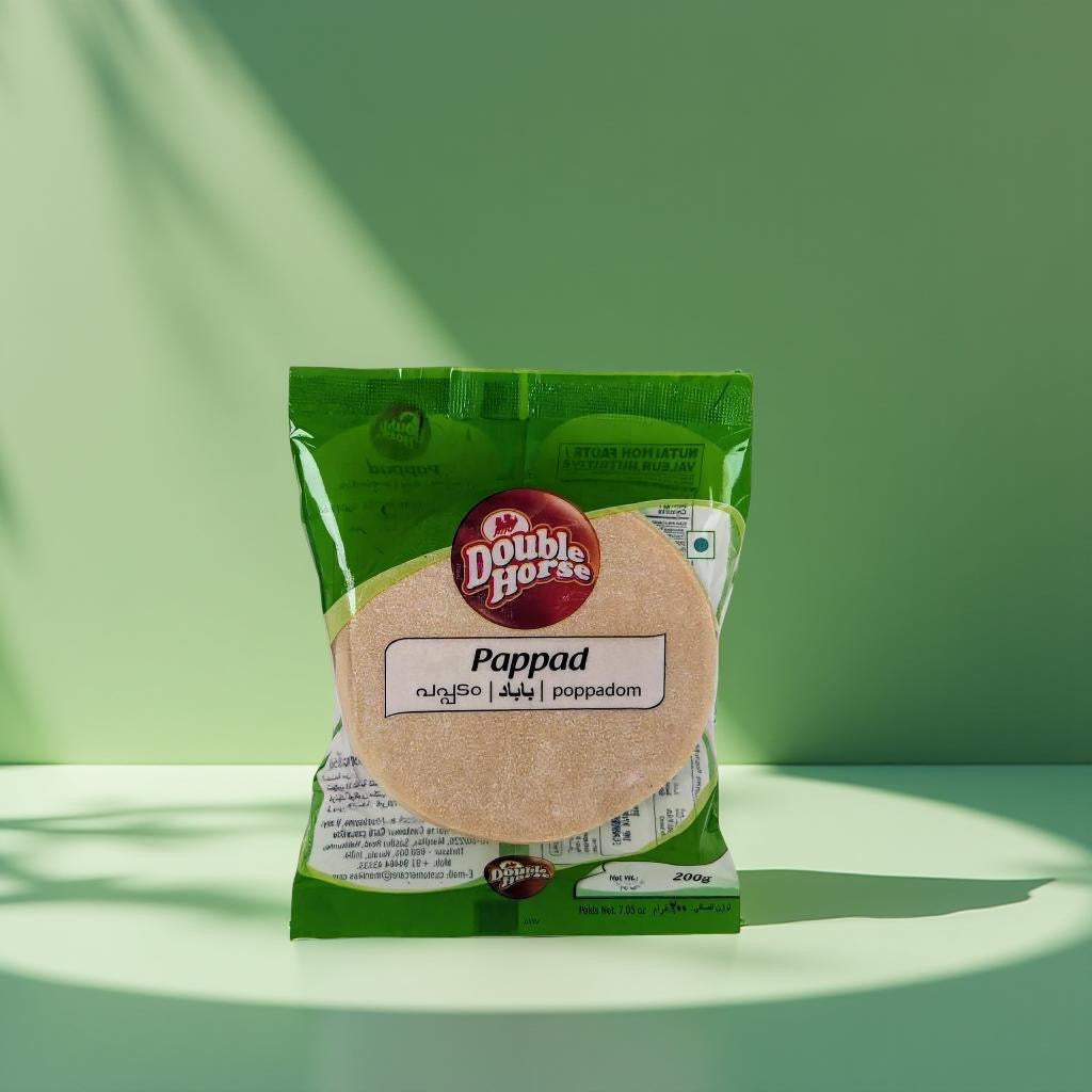 Green package of Double Horse Pappad on a green background
