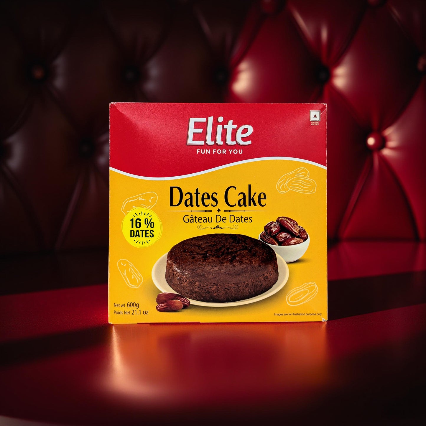 Box of Elite Dates Cake on a dark red background