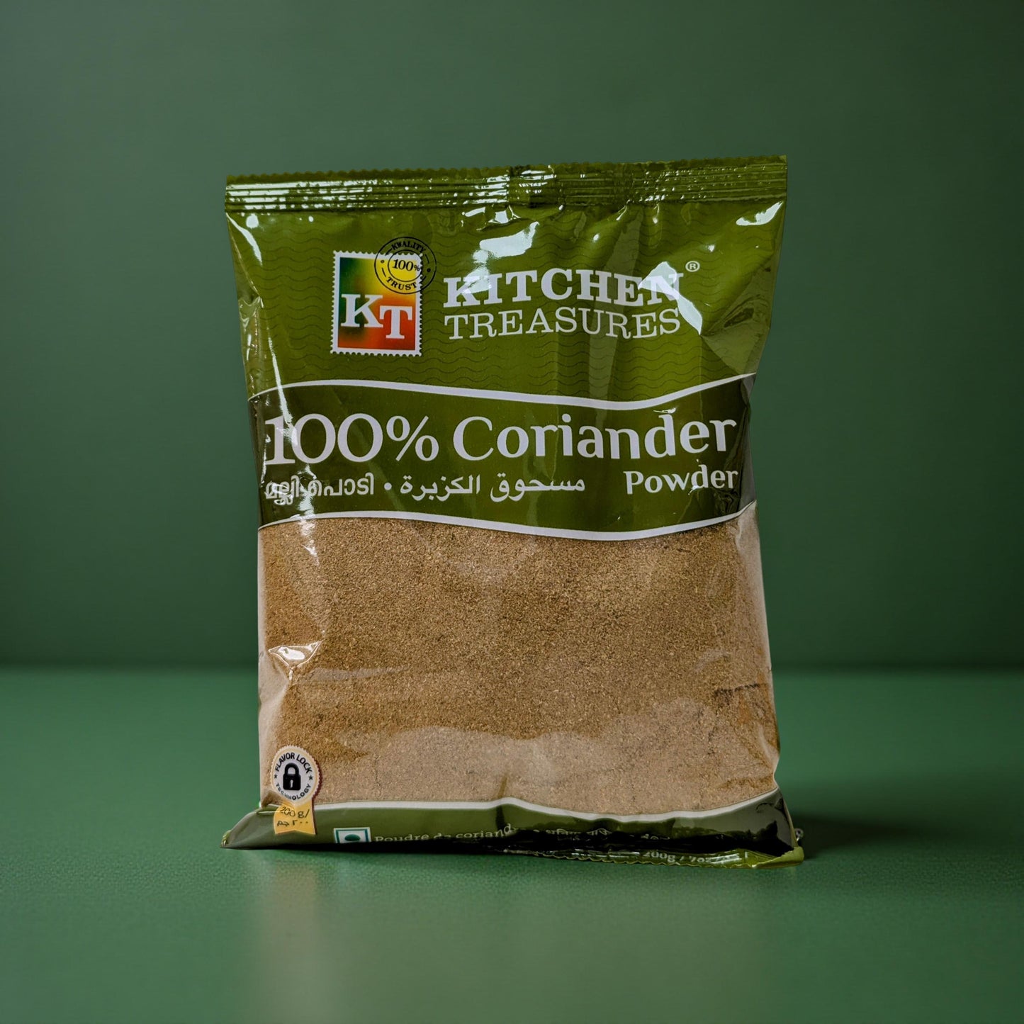 Bag of Kitchen Treasures 100% Coriander Powder on a green background