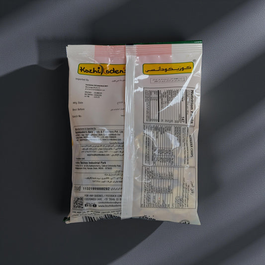 Two packages with nutritional information labels on a dark background