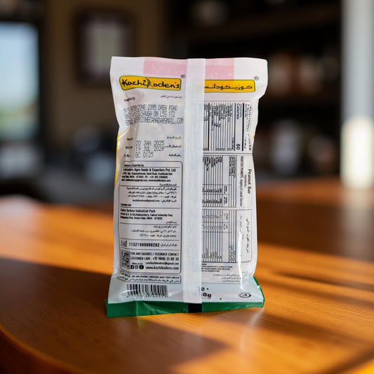 Nestle chocolate bar packaging on a wooden surface with blurred background