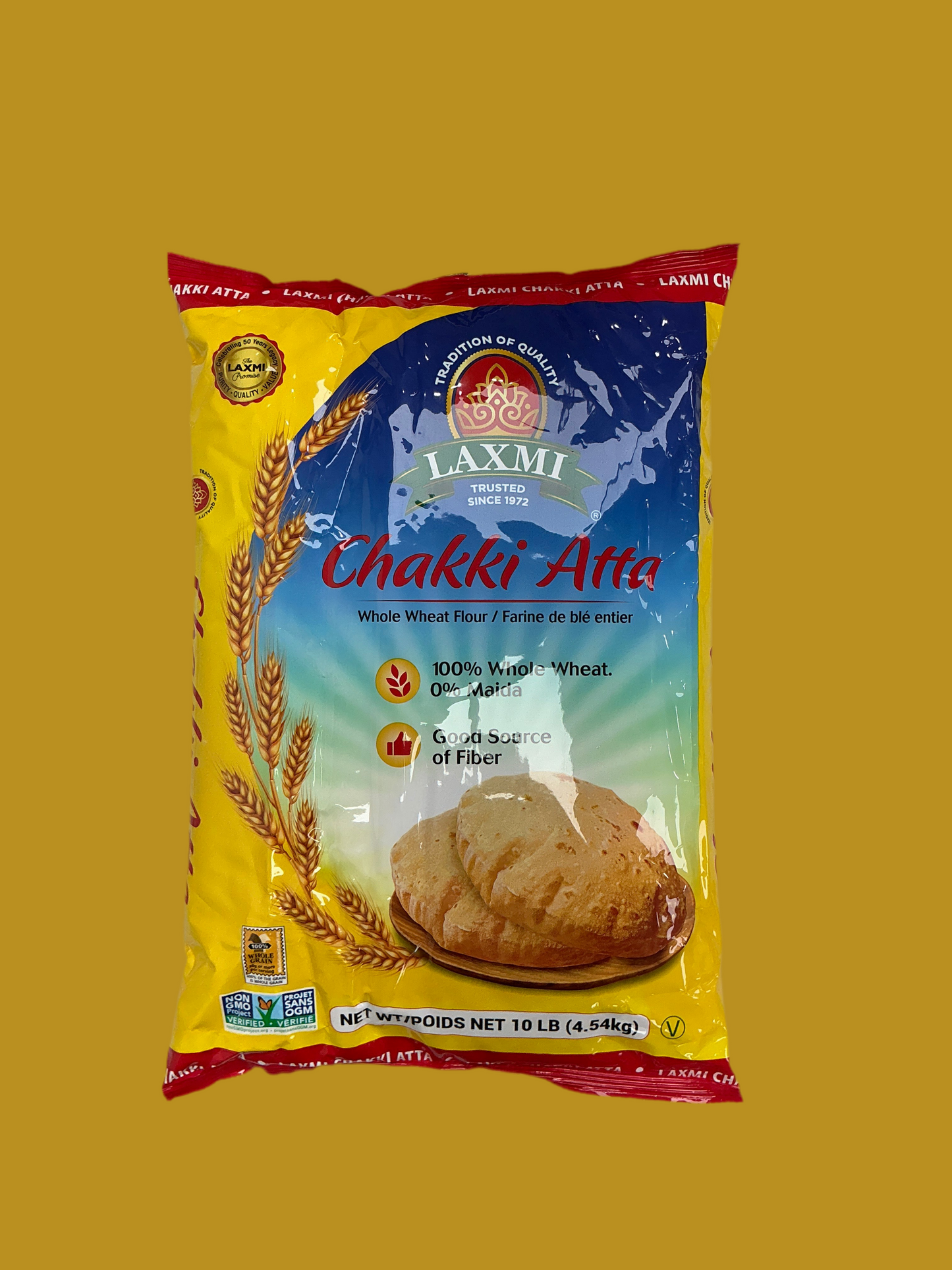 Laxmi Chakki Atta packaging on a yellow background