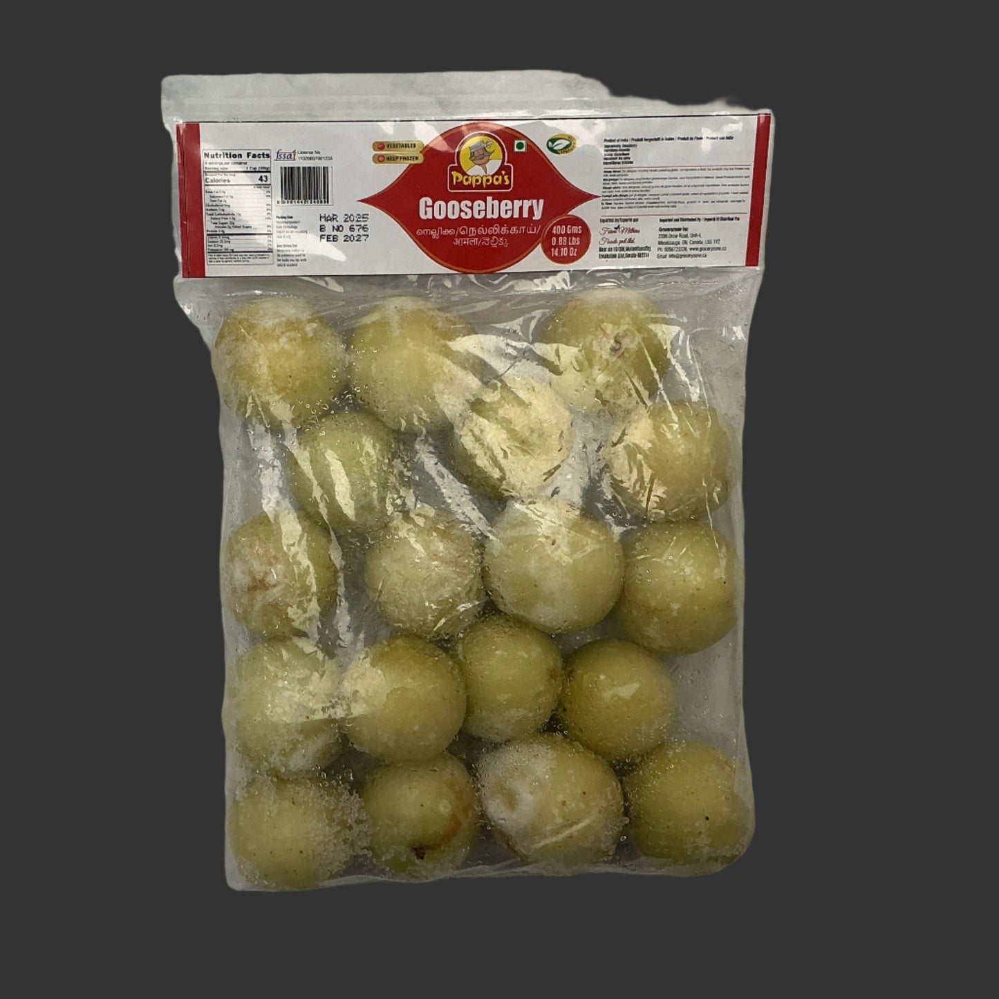 Packaged gooseberries on a marble surface