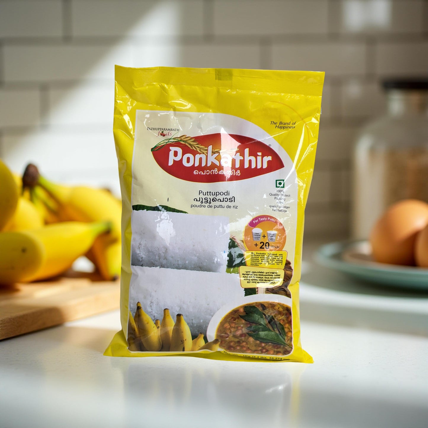 Ponkathir packaging on a kitchen counter with bananas in the background