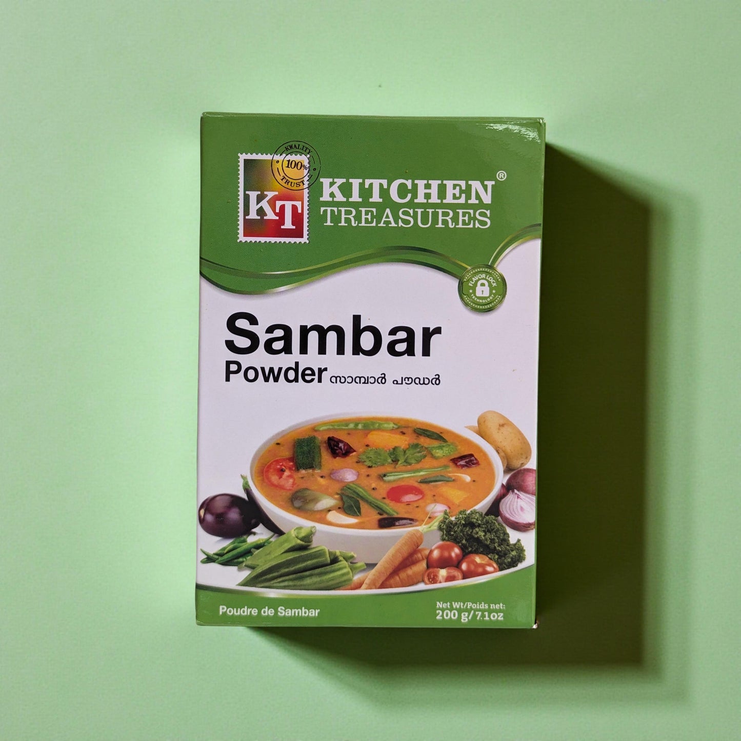 Box of Kitchen Treasures Sambar Powder on a green background