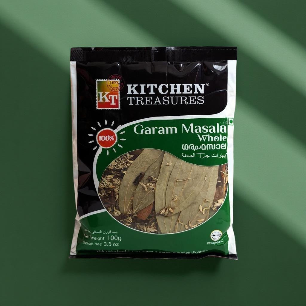 Packaging of Kitchen Treasures Garam Masala Whole on a green background