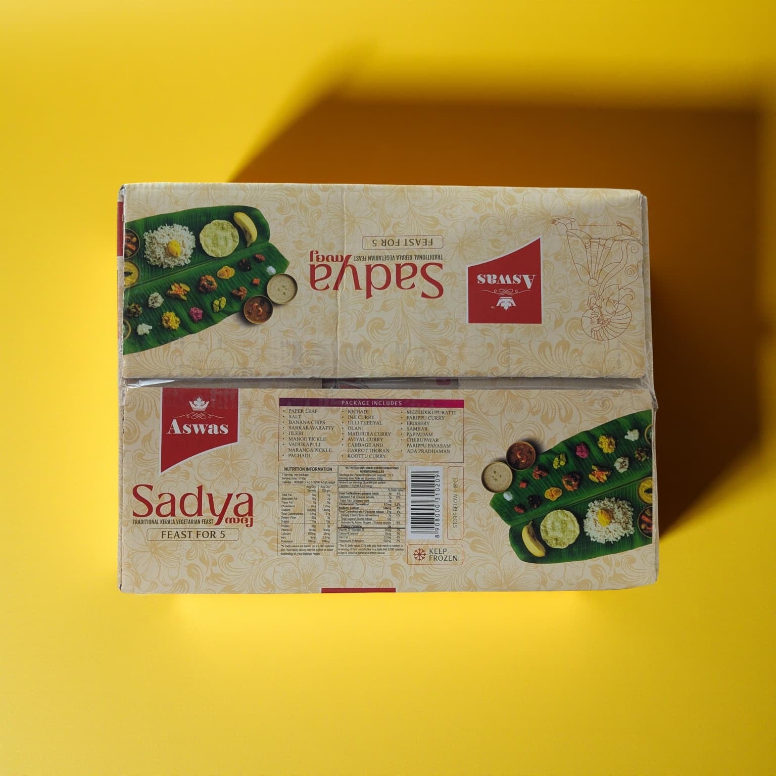 Aswaa Sadaa food packaging on a yellow background
