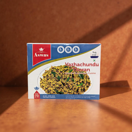 Aswas Vazhachundu Thoran packaging on a wooden surface