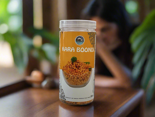 Kara Boondi container on a table with a blurred background