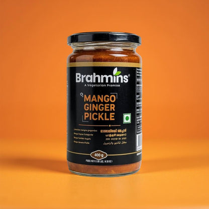 Jar of Brahmins Mango Ginger Pickle on an orange background