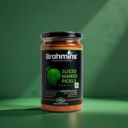 Jar of Brahmins Sliced Mango Pickle on a green background