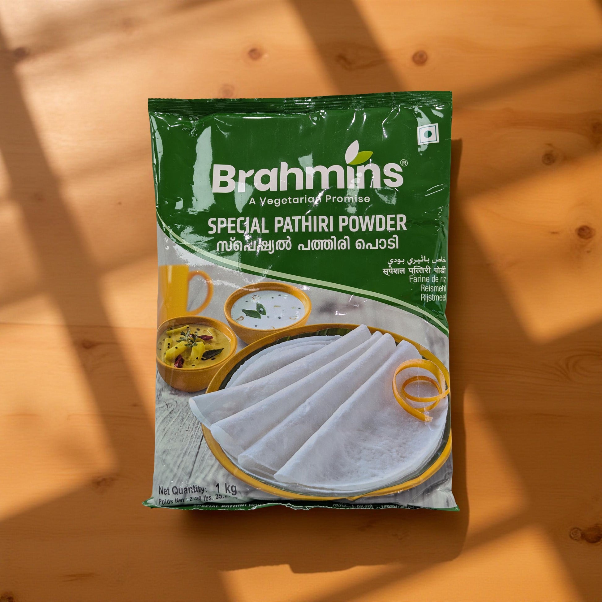 Brahmin's Special Pathiri Powder packaging on a wooden surface