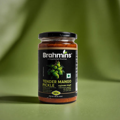 Jar of Brahmins Tender Mango Pickle on a green background