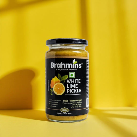 Jar of Brahmins White Lime Pickle on a yellow background
