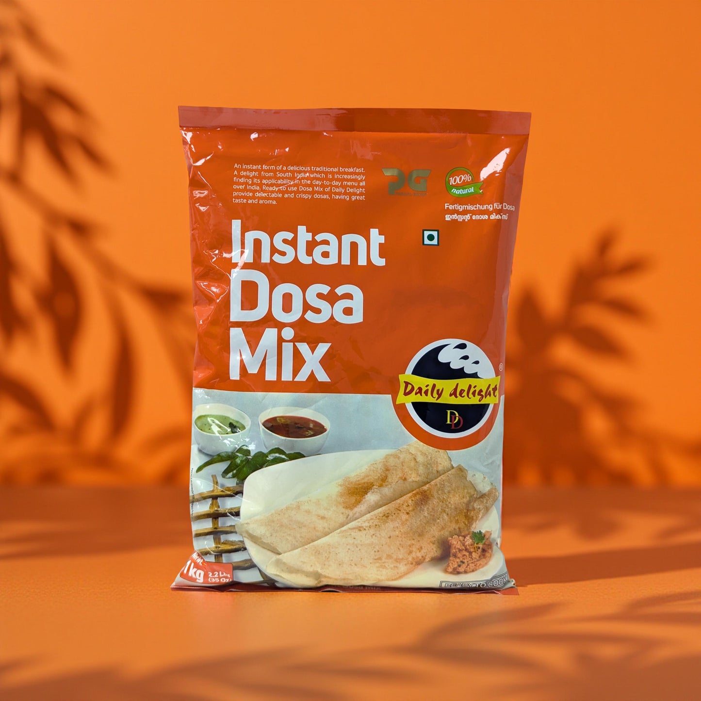 Packaging of Instant Dosa Mix with an orange background