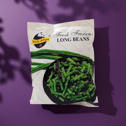 Packaged frozen long beans with a brand logo on a purple background