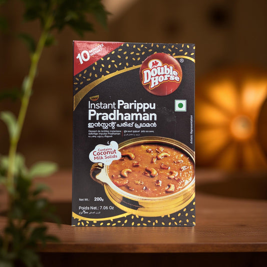 Double Horse Instant Parippu Pradhaman packaging on a wooden surface with a blurred background