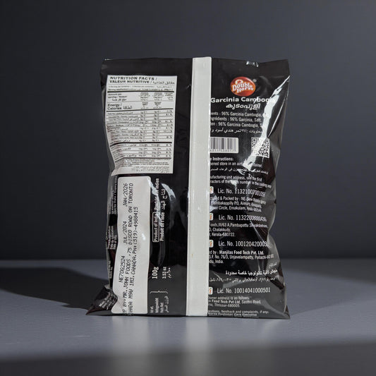 Black and white supplement package with text on a dark background