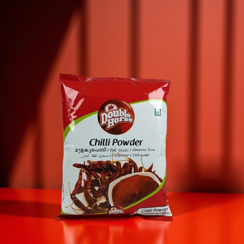 Double Horse Chilli Powder packet on a red background