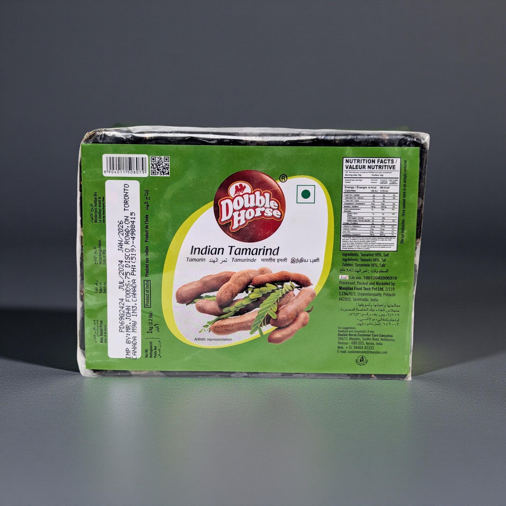 Double Horse Indian Tamarind package on a gray background