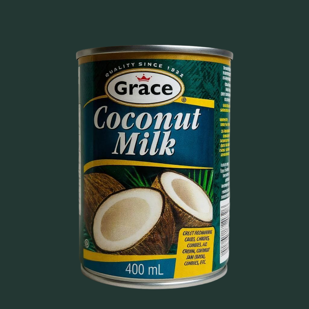 Can of Grace Coconut Milk with coconuts on a dark background