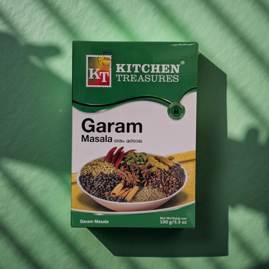 Kitchen Treasures Garam Masala spice box on a green background