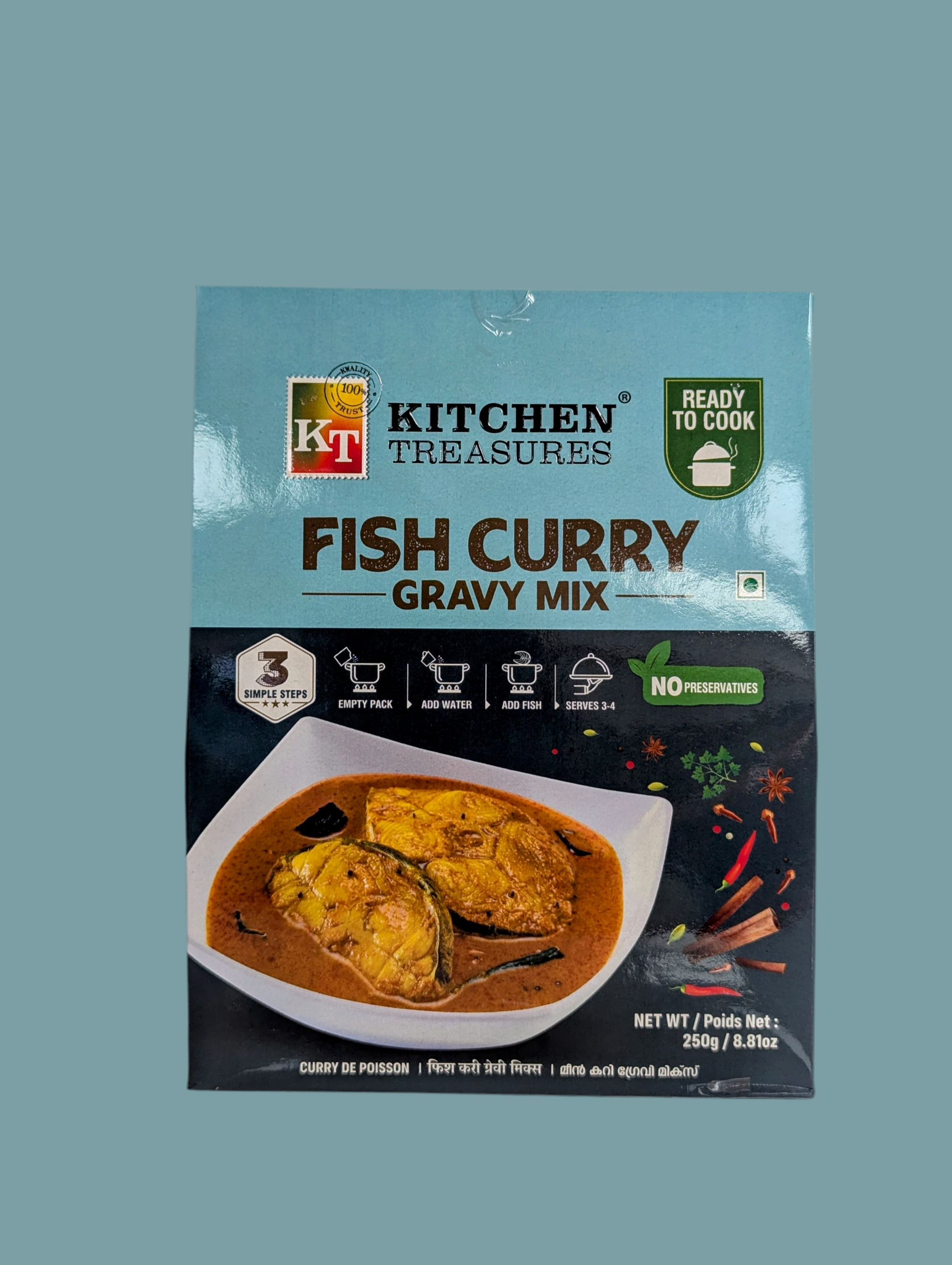 Packaging of Kitchen Treasures Fish Curry Gravy Mix on a light blue background