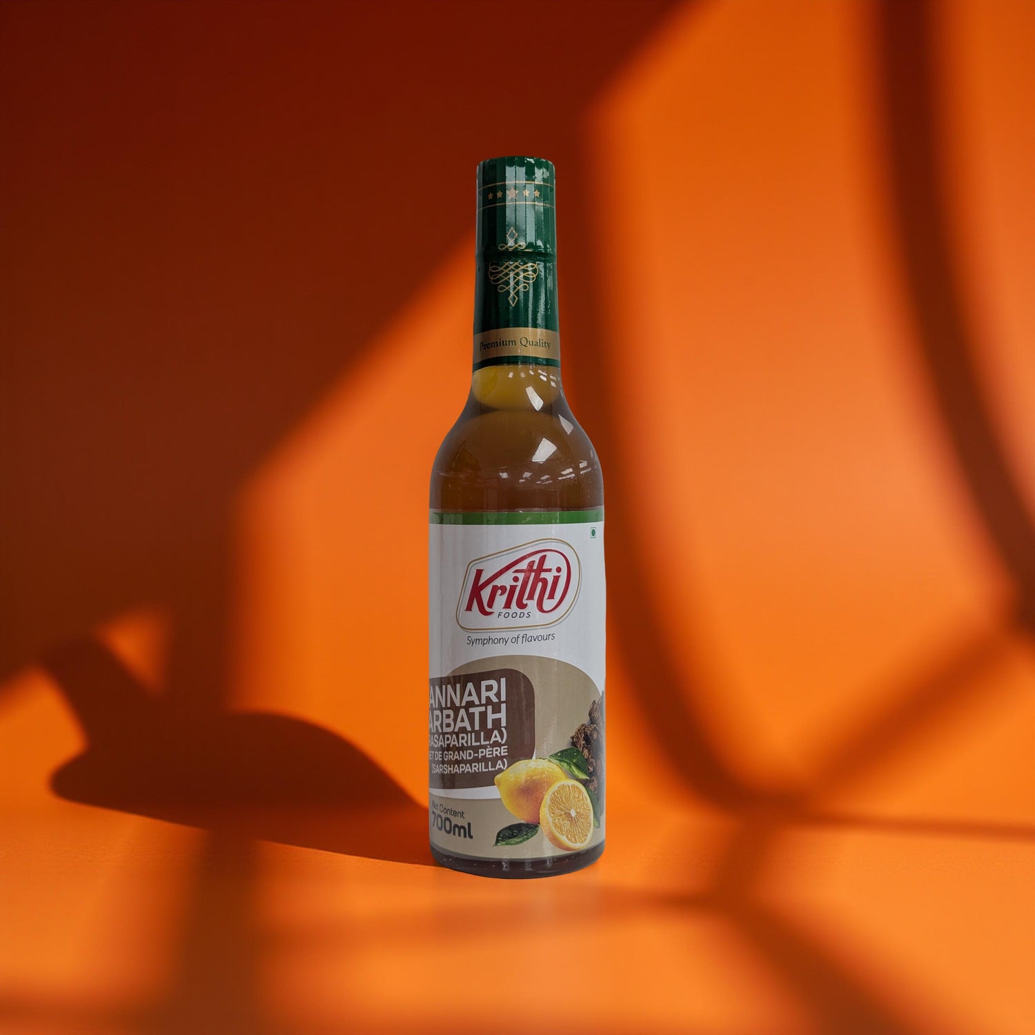 Bottle of Krithi sambar on an orange background