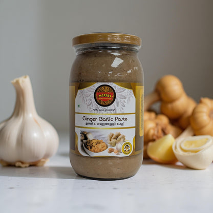 Jar of Ginger Garlic Paste with garlic and ginger on a light background