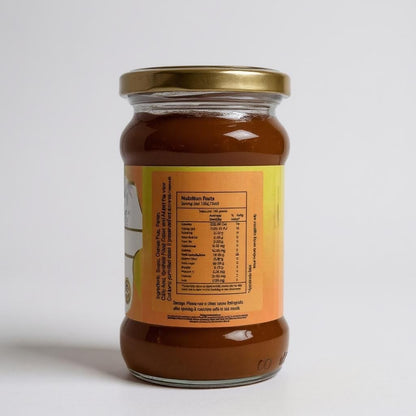 Jar of honey with a label on a white background