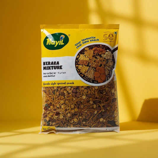 Mayil brand Kerara Mixture package on a yellow background