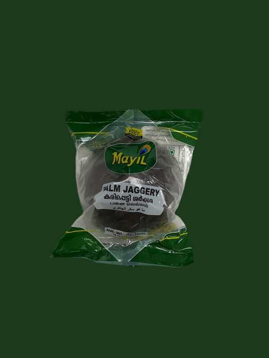 Packaged jaggery with Mayil brand logo on a green background