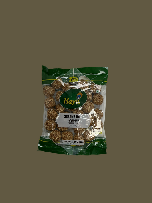 Packaged sesame balls with Maya branding on a brown background
