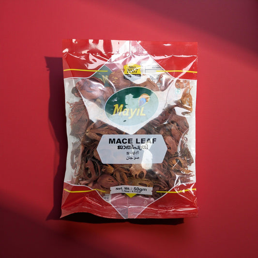 Packaged mace leaf on a red background