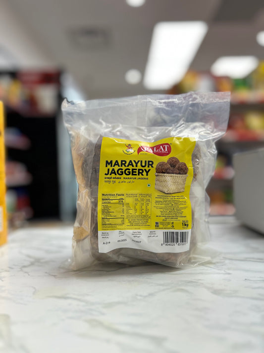 Packaged Marayur Jaggery on a table with a blurred background