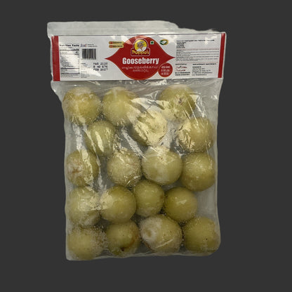 Packaged gooseberries on a marble surface