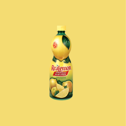 Bottle of ReaLemon lemon juice on a yellow background