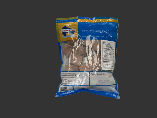Package of dog treats with visible brand logo on a gray background