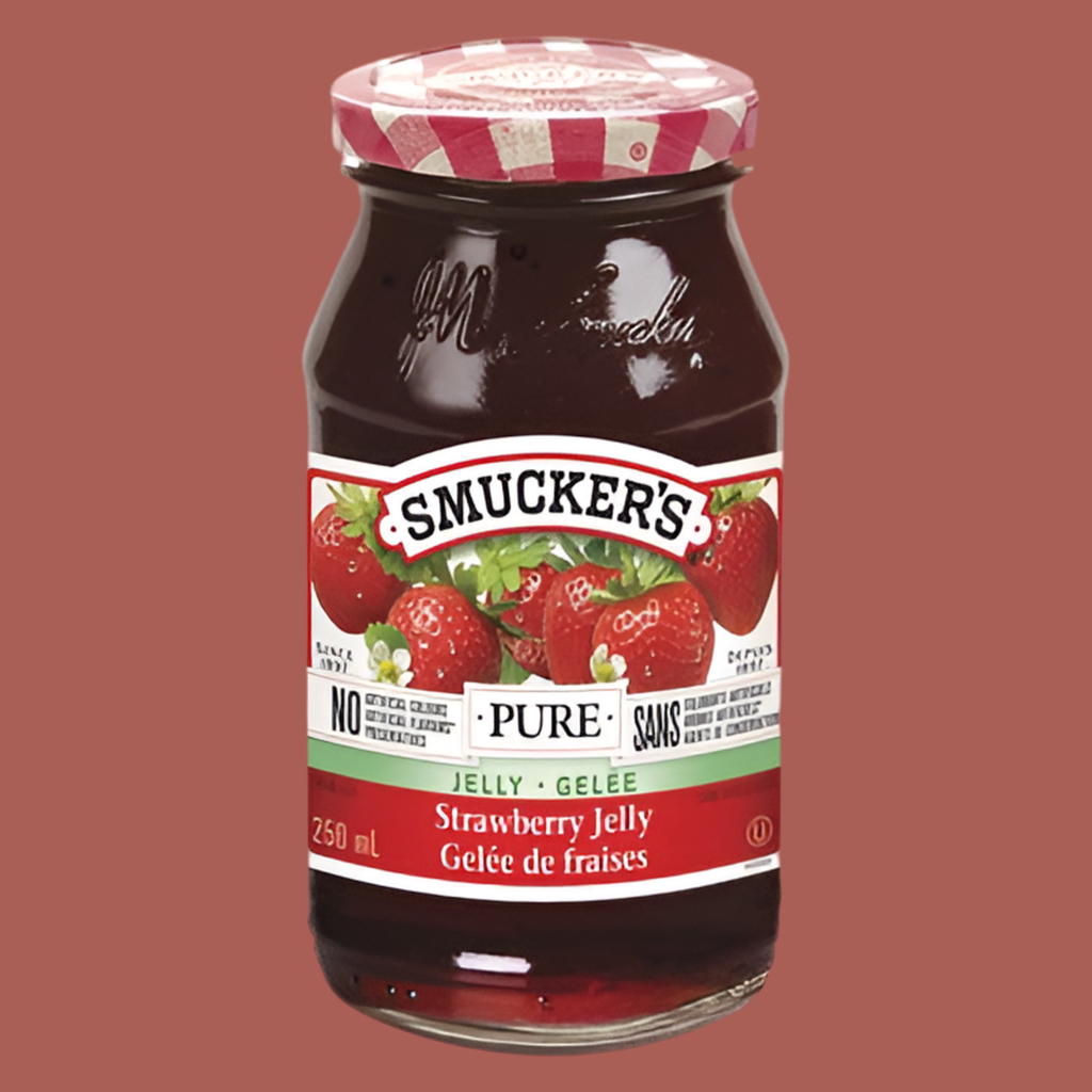 Jar of Smucker's Strawberry Jelly on a brown background