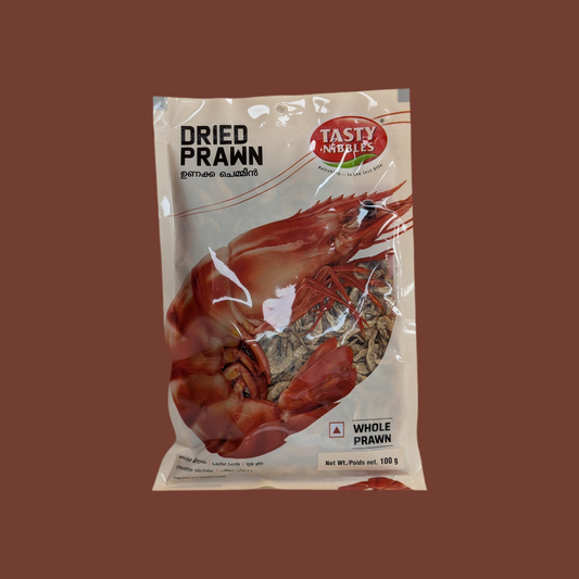 Packaged dried prawn with 'Tasty Mebles' branding on a brown background