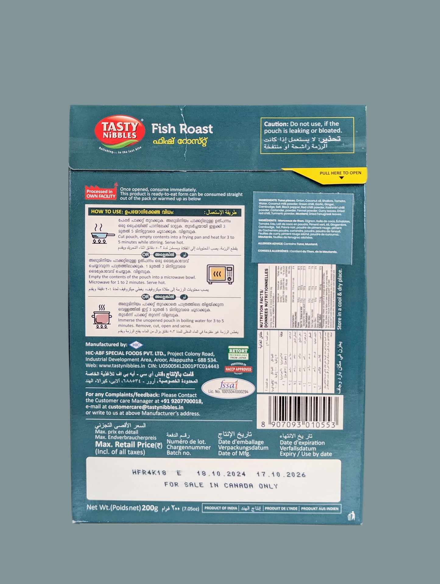 Back view of a Tasty Nibbles fish roast packaging on a gray background