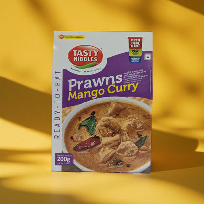 Tasty Nibbles Prawns Mango Curry packaging on a yellow background