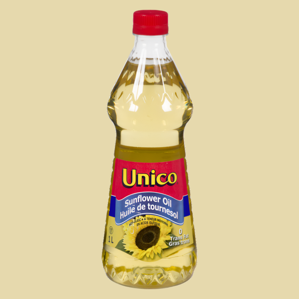 Bottle of Unico sunflower oil on a beige background
