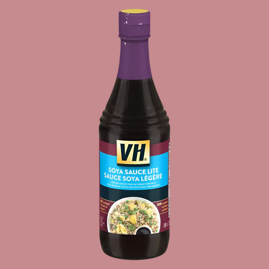 Bottle of VH Soya Sauce Lite on a pink background